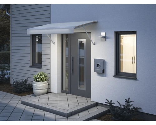 Fassade eines Hauses mit Vordach, Haustür, Briefkasten und Fenstern