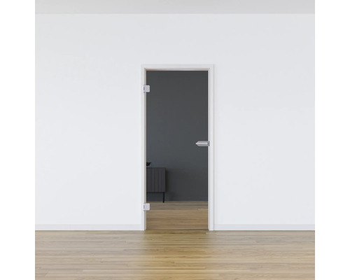Vue d''une pièce avec une porte en verre dans un cadre blanc
