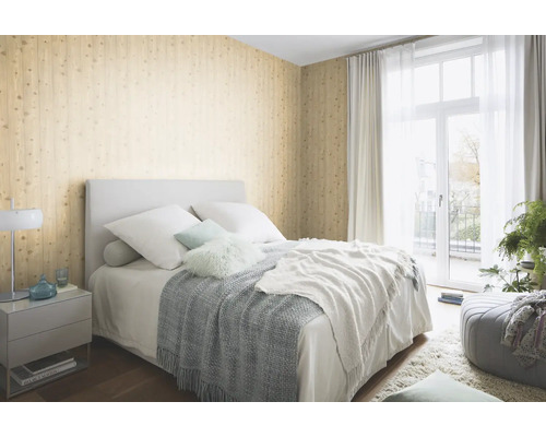 Chambre à coucher avec papier peint mural en bois, lit et table de chevet