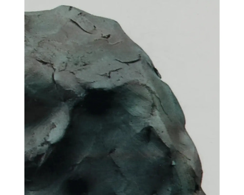Gros plan d''une sculpture couleur bronze
