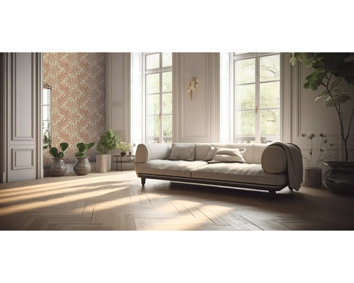 Salon avec canapé, plantes et papier peint à motif de feuilles