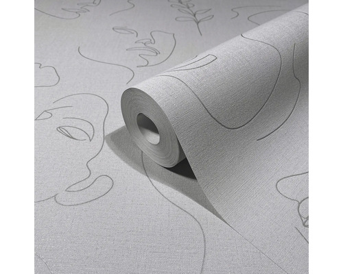 Tapetenrolle mit Gesichtern als Motiv