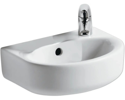 Lavabo en céramique avec robinet