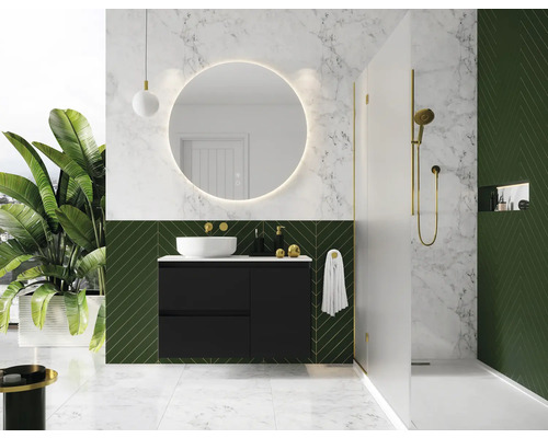 Modernes Badezimmer mit schwarzem Waschtischunterschrank, rundem Spiegel mit Beleuchtung und Dusche.