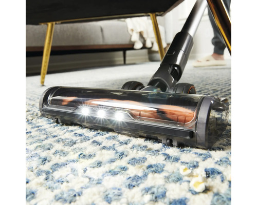 Aspirateur avec éclairage nettoie la moquette