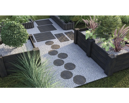 Jardin aménagé avec plates-bandes surélevées, sentier de pierres et gravier