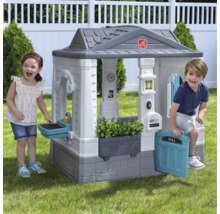 Maisonnette pour enfants avec boîte aux lettres et cuisine de jeu dans le jardin