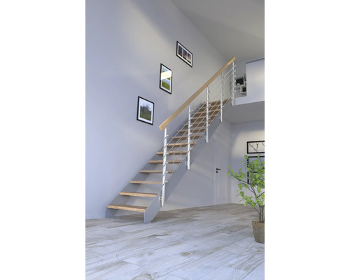 Escalier avec marches en bois et rampe en acier inoxydable dans une pièce aménagée de façon moderne.