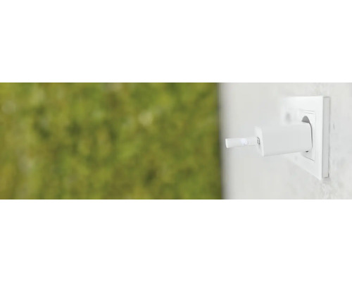 Adaptateur de prise dans une prise murale