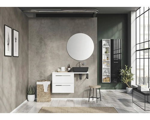 Modernes Badezimmer mit Waschtisch, rundem Spiegel und weißen Möbeln.