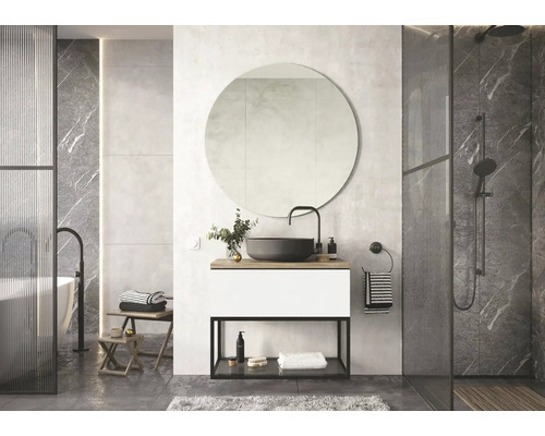 Salle de bains moderne avec meuble-lavabo, miroir rond, douche et baignoire