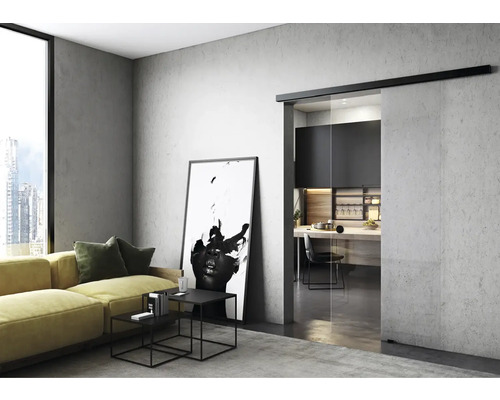 Salon avec porte coulissante donnant sur la cuisine.