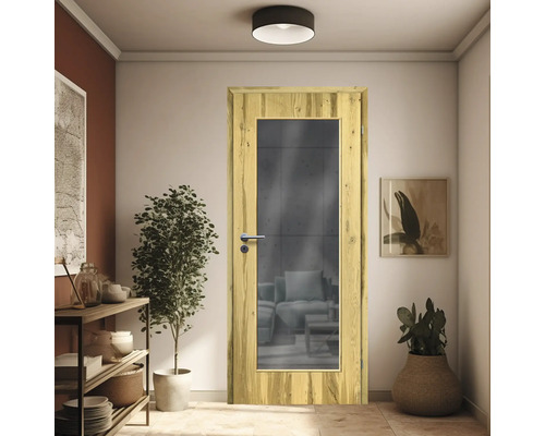 Porte intérieure avec insert en verre dans un couloir lumineux