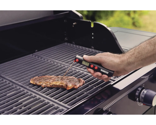 Tenneker Logo. Auf einem Grill liegt ein Steak, dessen Temperatur mit einem Grillthermometer gemessen wird.