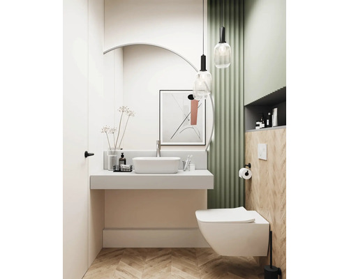 Salle de bain lumineuse avec lavabo, toilettes et éléments décoratifs