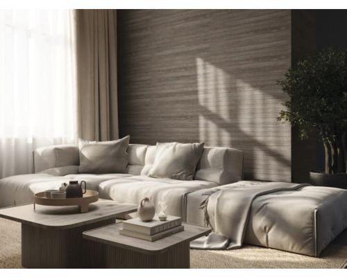 Wohnzimmer mit modularem Sofa, Couchtischen und Zimmerpflanze