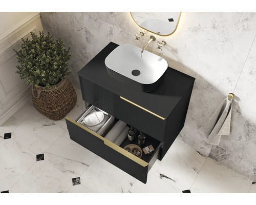 Salle de bains moderne avec meuble sous-lavabo noir, vasque à poser et tiroir ouvert