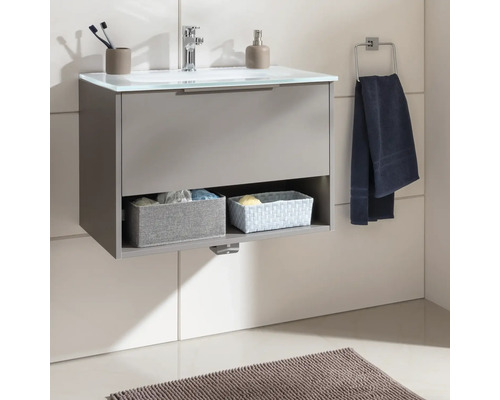 Meuble-lavabo avec tiroir, étagère et porte-serviettes dans la salle de bain