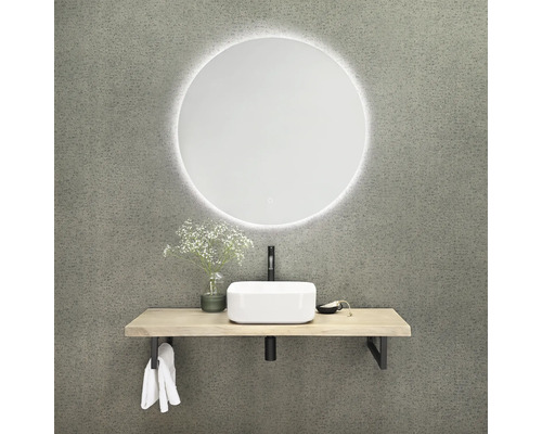 Salle de bains avec miroir rond, plan vasque et vasque à poser