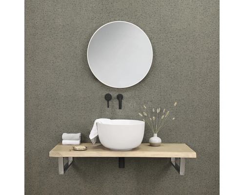 Modernes Badezimmer mit rundem Spiegel, Aufsatzwaschbecken, Waschtischplatte und Armaturen