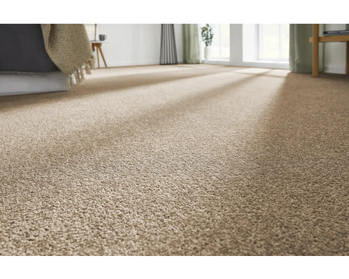 Gros plan d'une chambre avec moquette