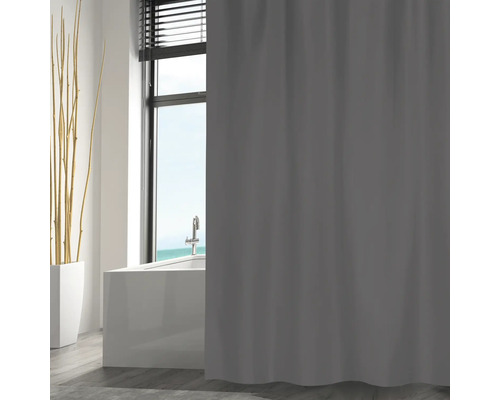 Badezimmer mit Badewanne und grauem Duschvorhang