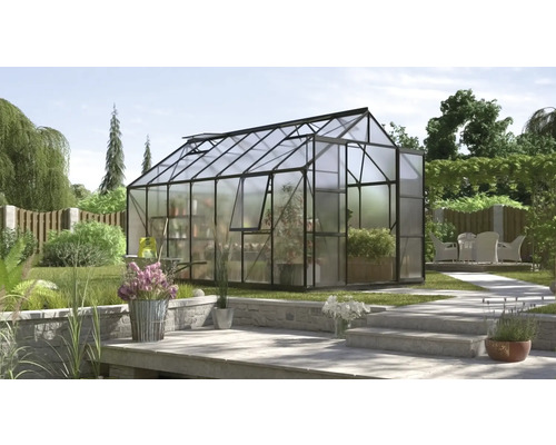 Gewächshaus Vitavia Jupiter 11500 Hohlkammerplatten 4 mm 257x445 cm schwarz Gewächshaus mit Pflanzen im Garten.