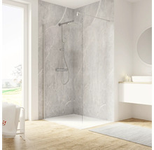 Salle de bains moderne avec cabine de douche, robinetterie de douche et meuble sous-vasque.