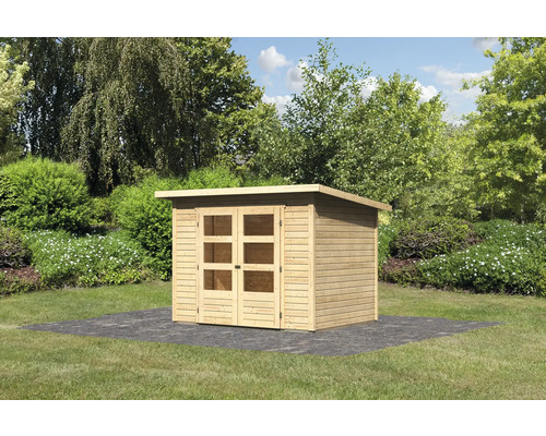 Abri de jardin en bois avec double porte et toit plat dans le jardin.