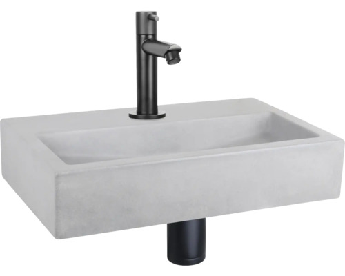 Vasque à poser en béton avec robinetterie