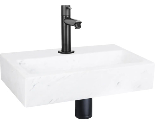 Waschbecken aus Marmor mit schwarzer Armatur