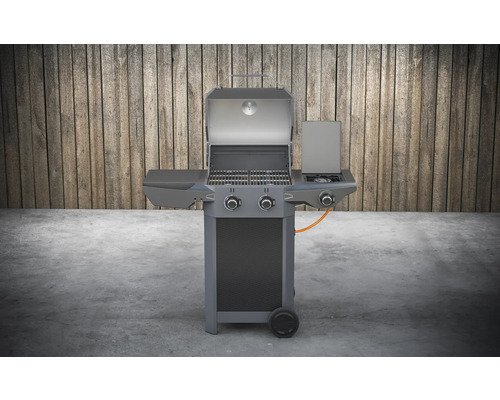 Gasgrill mit offener Haube und Seitenbrenner