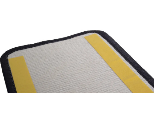 Reinigungspad mit Klebestreifen zur Befestigung.