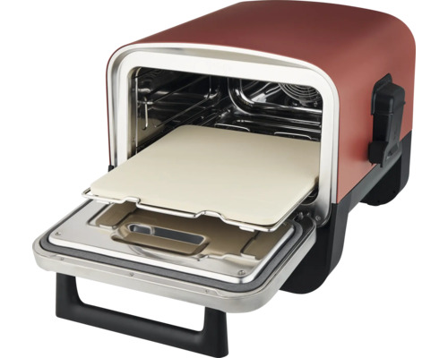 Four à pizza avec porte ouverte et pierre à pizza