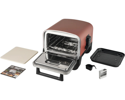 Four à convection Ninja avec accessoires, incluant une pierre à pizza, une plaque de cuisson, un ramasse-miettes et une cuillère à mesurer