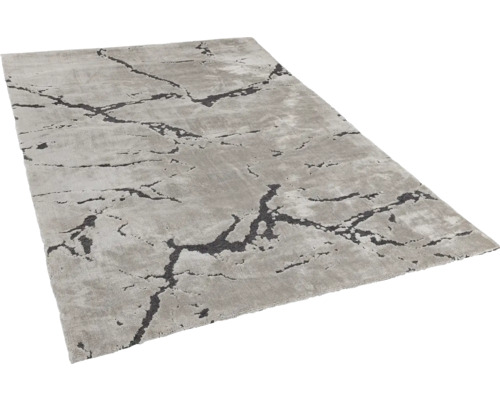 Tapis gris avec motif abstrait