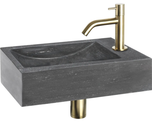 Waschtisch aus Stein mit goldener Armatur