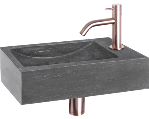 Rechteckiges Waschbecken aus Stein mit Armatur