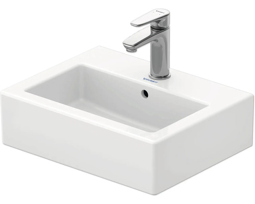 Lavabo en céramique avec robinet