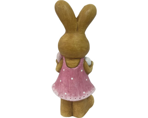 Figurine de lapin de Pâques avec robe et oeufs de Pâques