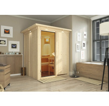 Sauna en bois avec porte en verre dans une salle de bain