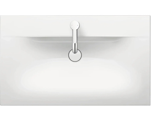 Image d''un lavabo à poser en céramique avec robinet