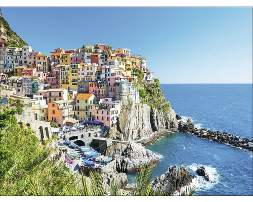 Leinwandbild Manarola Cinque Terre 116x84 cm Ansicht von Manarola, einem Küstenort in Italien, mit farbenfrohen Häusern auf einer Klippe über dem Meer.