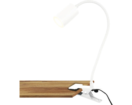 Klemmleuchte mit flexiblem Arm auf einer Holzoberfläche