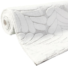 Tapis de bain enroulé avec motif de pierres