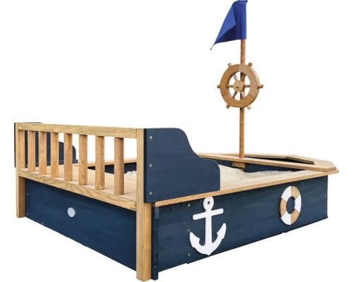 Sandkasten in Bootsform mit Steuerrad und Segel