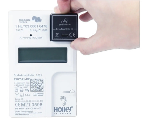 Gros plan d''un compteur électrique avec un appareil EcoTracker IR everHome connecté pour la surveillance de l''énergie.