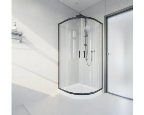 Eckdusche mit schwarzem Rahmen in einem hellen Badezimmer.