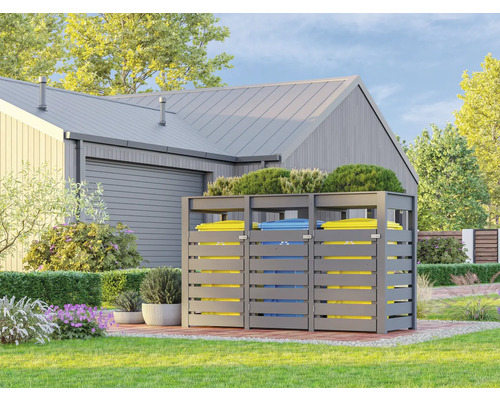 Cache-poubelle dans le jardin avec trois poubelles