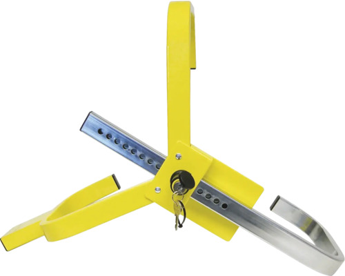 Gelbe Parkkralle mit Schlüssel zur Fahrzeugsicherung